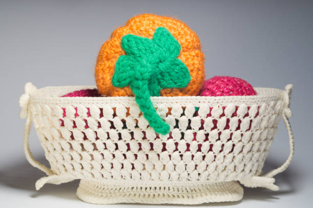 Complete vegetable-themed crochet kit with hook, yarn, tools, pattern, and instructions for beginners.
